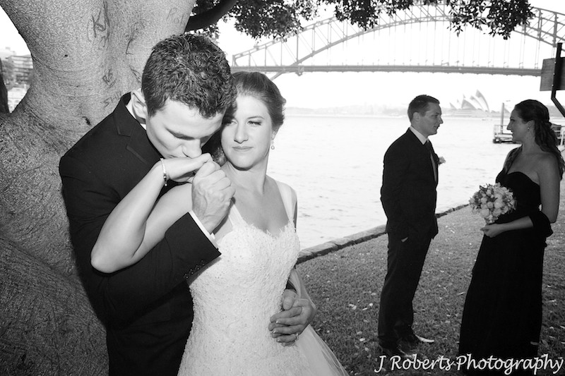 Groom kissing brides hand - wedding photography sydney